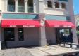 Awnings provide decorative functional storefront advertising. Serving Polk County Including Naples FL 
33999